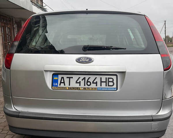Серый Форд Фокус, объемом двигателя 1.56 л и пробегом 300 тыс. км за 3550 $, фото 6 на Automoto.ua