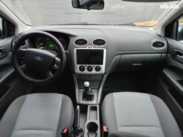 Серый Форд Фокус, объемом двигателя 1.6 л и пробегом 317 тыс. км за 3690 $, фото 12 на Automoto.ua