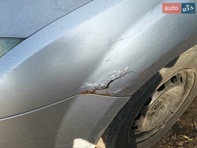 Серый Форд Фокус, объемом двигателя 1.56 л и пробегом 300 тыс. км за 3200 $, фото 2 на Automoto.ua