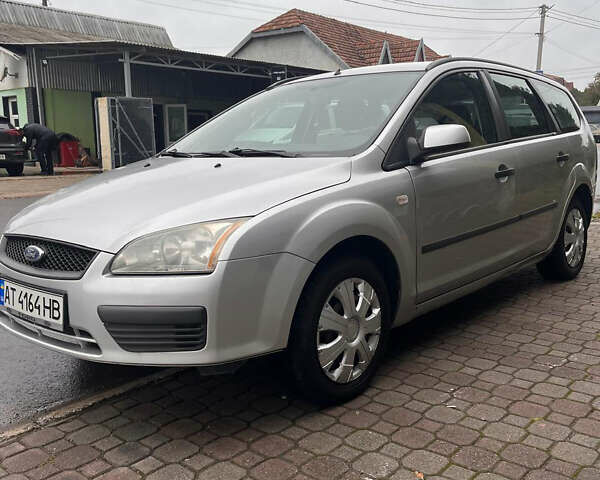 Серый Форд Фокус, объемом двигателя 1.56 л и пробегом 300 тыс. км за 3550 $, фото 1 на Automoto.ua