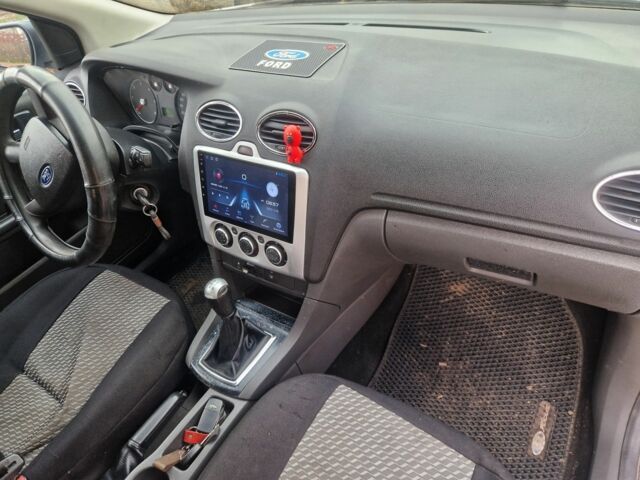 Серый Форд Фокус, объемом двигателя 1.6 л и пробегом 293 тыс. км за 4500 $, фото 7 на Automoto.ua