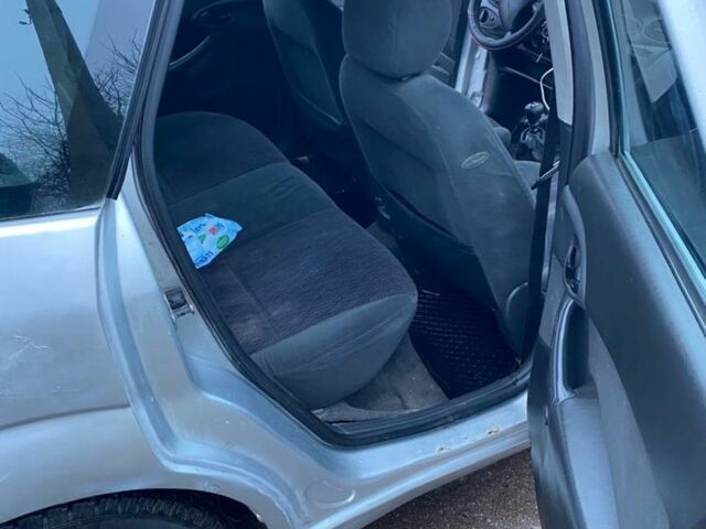 Сірий Форд Фокус, об'ємом двигуна 1.8 л та пробігом 240 тис. км за 1600 $, фото 7 на Automoto.ua