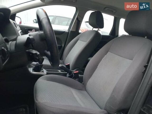 Серый Форд Фокус, объемом двигателя 1.6 л и пробегом 317 тыс. км за 3690 $, фото 20 на Automoto.ua