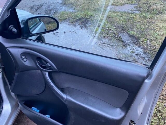 Сірий Форд Фокус, об'ємом двигуна 1.8 л та пробігом 240 тис. км за 1600 $, фото 12 на Automoto.ua