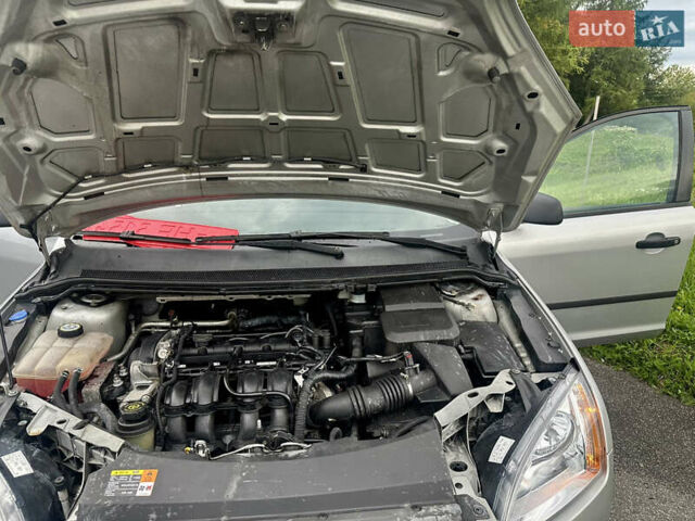 Серый Форд Фокус, объемом двигателя 1.6 л и пробегом 176 тыс. км за 4599 $, фото 34 на Automoto.ua