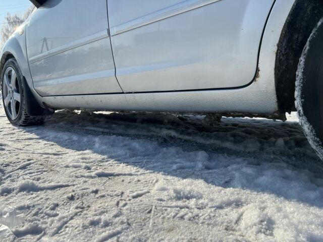 Сірий Форд Фокус, об'ємом двигуна 2 л та пробігом 347 тис. км за 2100 $, фото 5 на Automoto.ua