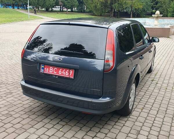 Сірий Форд Фокус, об'ємом двигуна 1.6 л та пробігом 229 тис. км за 4999 $, фото 4 на Automoto.ua