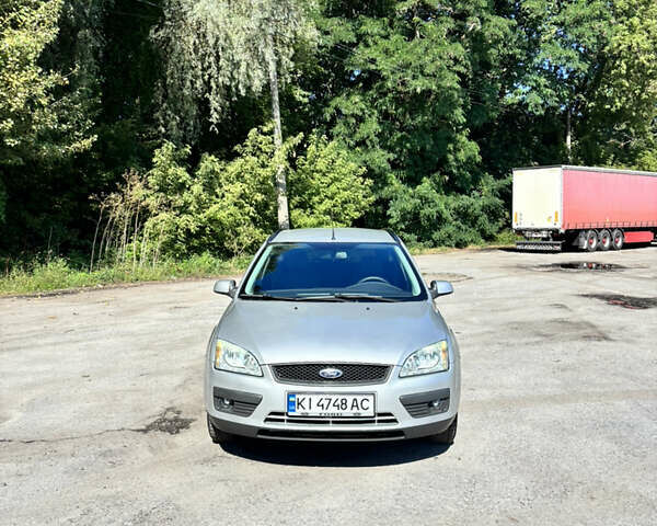 Серый Форд Фокус, объемом двигателя 1.6 л и пробегом 235 тыс. км за 4950 $, фото 2 на Automoto.ua