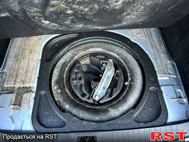 Серый Форд Фокус, объемом двигателя 1.6 л и пробегом 277 тыс. км за 4700 $, фото 11 на Automoto.ua