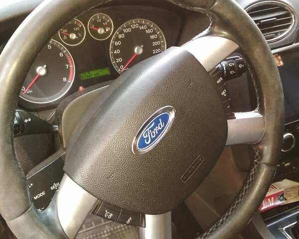 Серый Форд Фокус, объемом двигателя 1.6 л и пробегом 367 тыс. км за 4450 $, фото 6 на Automoto.ua