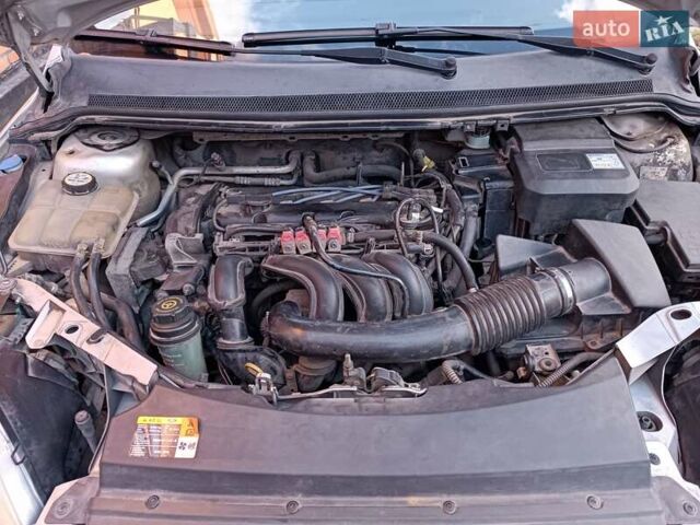 Серый Форд Фокус, объемом двигателя 1.6 л и пробегом 359 тыс. км за 3899 $, фото 12 на Automoto.ua