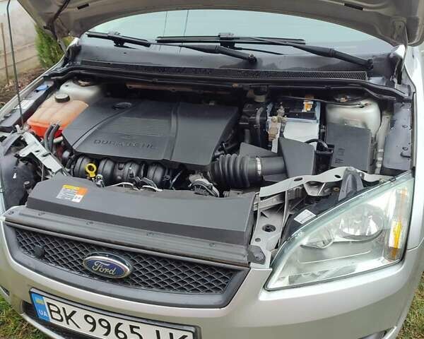 Серый Форд Фокус, объемом двигателя 1.8 л и пробегом 230 тыс. км за 4900 $, фото 6 на Automoto.ua