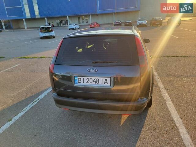 Сірий Форд Фокус, об'ємом двигуна 1.6 л та пробігом 319 тис. км за 5600 $, фото 9 на Automoto.ua