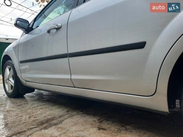 Серый Форд Фокус, объемом двигателя 1.75 л и пробегом 295 тыс. км за 4600 $, фото 8 на Automoto.ua