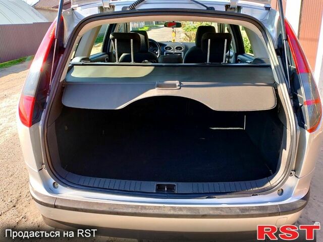 Серый Форд Фокус, объемом двигателя 1.8 л и пробегом 202 тыс. км за 4200 $, фото 5 на Automoto.ua