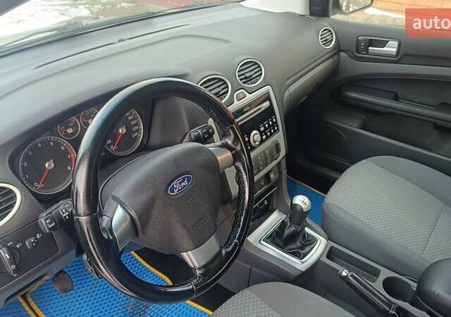 Серый Форд Фокус, объемом двигателя 1.8 л и пробегом 227 тыс. км за 4900 $, фото 22 на Automoto.ua