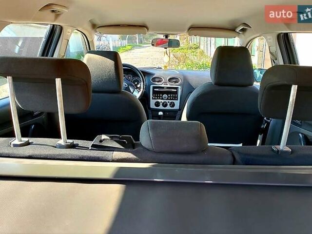 Серый Форд Фокус, объемом двигателя 1.8 л и пробегом 202 тыс. км за 4200 $, фото 5 на Automoto.ua