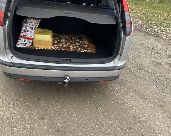 Серый Форд Фокус, объемом двигателя 1.6 л и пробегом 290 тыс. км за 4500 $, фото 5 на Automoto.ua