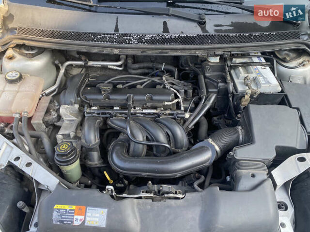 Серый Форд Фокус, объемом двигателя 1.6 л и пробегом 224 тыс. км за 4950 $, фото 17 на Automoto.ua