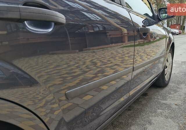 Серый Форд Фокус, объемом двигателя 1.6 л и пробегом 214 тыс. км за 5550 $, фото 18 на Automoto.ua