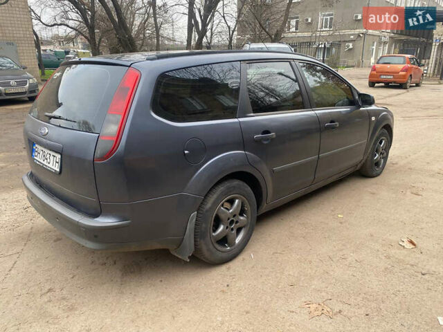 Серый Форд Фокус, объемом двигателя 1.56 л и пробегом 270 тыс. км за 3450 $, фото 5 на Automoto.ua