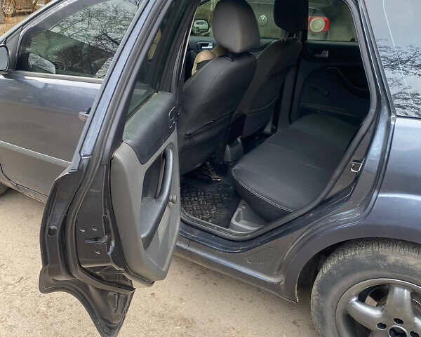 Серый Форд Фокус, объемом двигателя 1.56 л и пробегом 270 тыс. км за 3450 $, фото 10 на Automoto.ua