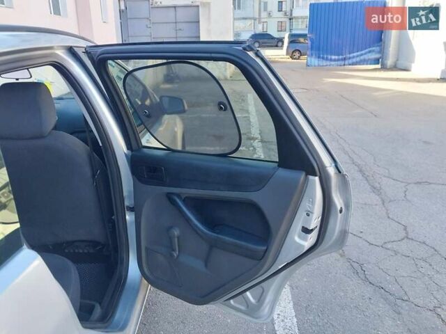 Серый Форд Фокус, объемом двигателя 1.6 л и пробегом 211 тыс. км за 3600 $, фото 19 на Automoto.ua