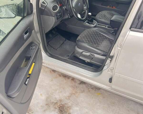 Серый Форд Фокус, объемом двигателя 1.56 л и пробегом 278 тыс. км за 4700 $, фото 7 на Automoto.ua