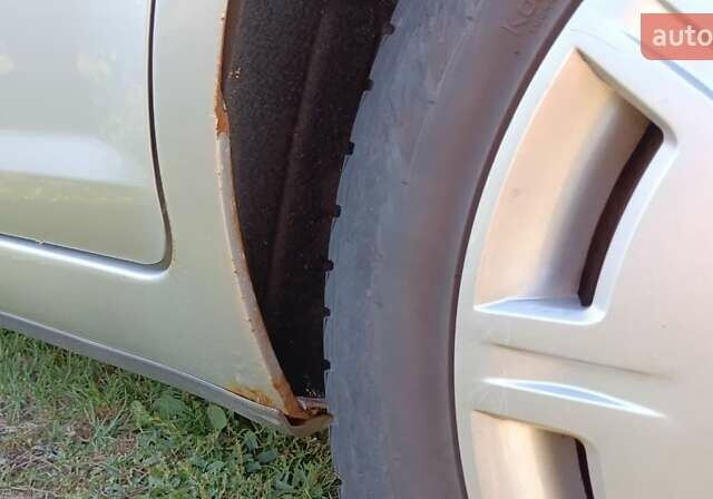 Серый Форд Фокус, объемом двигателя 1.8 л и пробегом 258 тыс. км за 4200 $, фото 11 на Automoto.ua