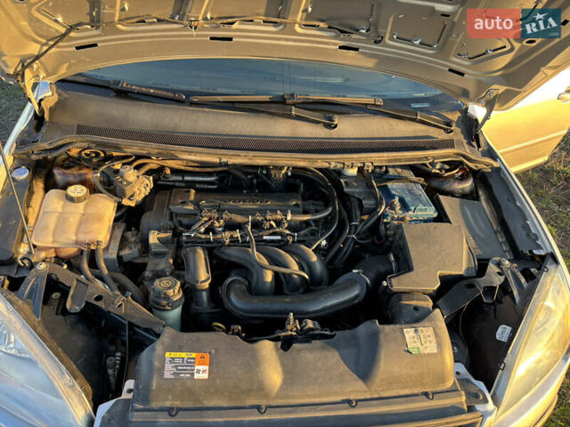 Серый Форд Фокус, объемом двигателя 1.6 л и пробегом 202 тыс. км за 4999 $, фото 14 на Automoto.ua