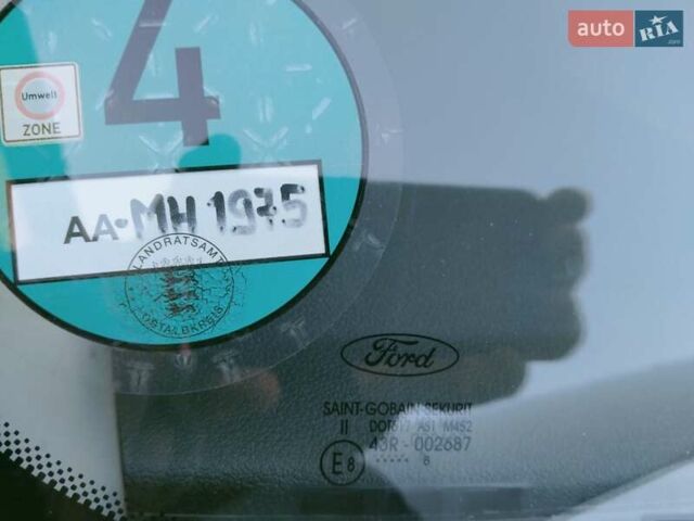 Серый Форд Фокус, объемом двигателя 1.8 л и пробегом 208 тыс. км за 5100 $, фото 10 на Automoto.ua