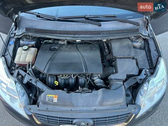 Серый Форд Фокус, объемом двигателя 2 л и пробегом 243 тыс. км за 5700 $, фото 7 на Automoto.ua