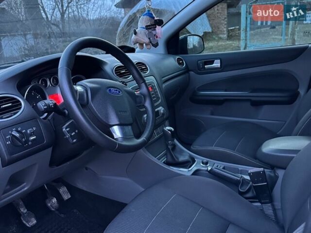 Серый Форд Фокус, объемом двигателя 1.8 л и пробегом 208 тыс. км за 5850 $, фото 16 на Automoto.ua