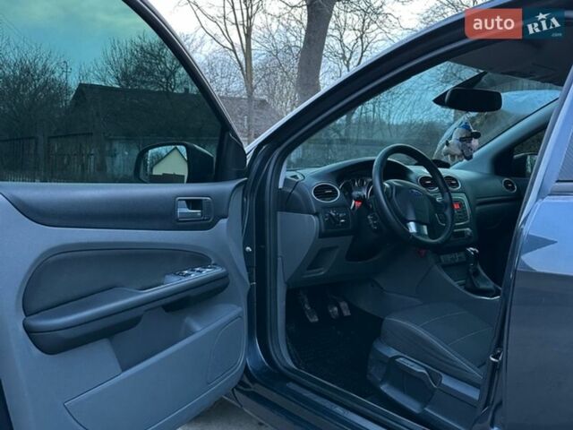 Серый Форд Фокус, объемом двигателя 1.8 л и пробегом 208 тыс. км за 5850 $, фото 17 на Automoto.ua