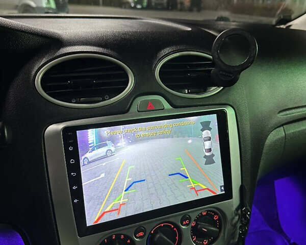 Серый Форд Фокус, объемом двигателя 1.8 л и пробегом 235 тыс. км за 5900 $, фото 12 на Automoto.ua