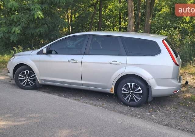 Серый Форд Фокус, объемом двигателя 1.6 л и пробегом 425 тыс. км за 4200 $, фото 6 на Automoto.ua