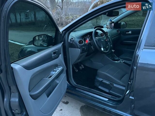 Серый Форд Фокус, объемом двигателя 1.8 л и пробегом 208 тыс. км за 5850 $, фото 14 на Automoto.ua