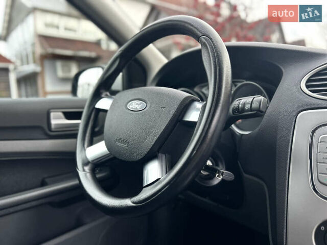Сірий Форд Фокус, об'ємом двигуна 1.6 л та пробігом 165 тис. км за 6499 $, фото 56 на Automoto.ua