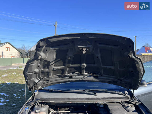 Серый Форд Фокус, объемом двигателя 1.6 л и пробегом 300 тыс. км за 5400 $, фото 18 на Automoto.ua