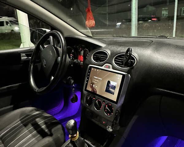 Серый Форд Фокус, объемом двигателя 1.8 л и пробегом 235 тыс. км за 5900 $, фото 9 на Automoto.ua