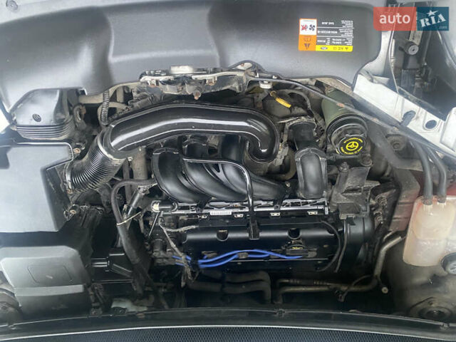 Серый Форд Фокус, объемом двигателя 1.6 л и пробегом 228 тыс. км за 4650 $, фото 29 на Automoto.ua