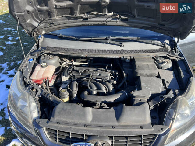Серый Форд Фокус, объемом двигателя 1.6 л и пробегом 300 тыс. км за 5400 $, фото 20 на Automoto.ua