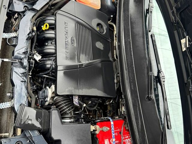 Серый Форд Фокус, объемом двигателя 1.8 л и пробегом 180 тыс. км за 2700 $, фото 10 на Automoto.ua