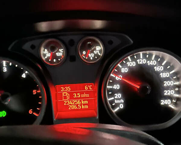 Серый Форд Фокус, объемом двигателя 1.8 л и пробегом 235 тыс. км за 5900 $, фото 14 на Automoto.ua