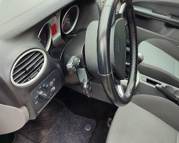 Форд Фокус 2009 у Белой Церкве на Automoto.ua Сірий Форд Фокус, об'ємом двигуна 1.8 л та пробігом 195 тис. км за 5699 $, фото 3 на Automoto.ua