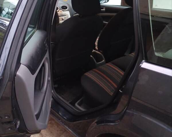 Серый Форд Фокус, объемом двигателя 1.6 л и пробегом 174 тыс. км за 4900 $, фото 3 на Automoto.ua