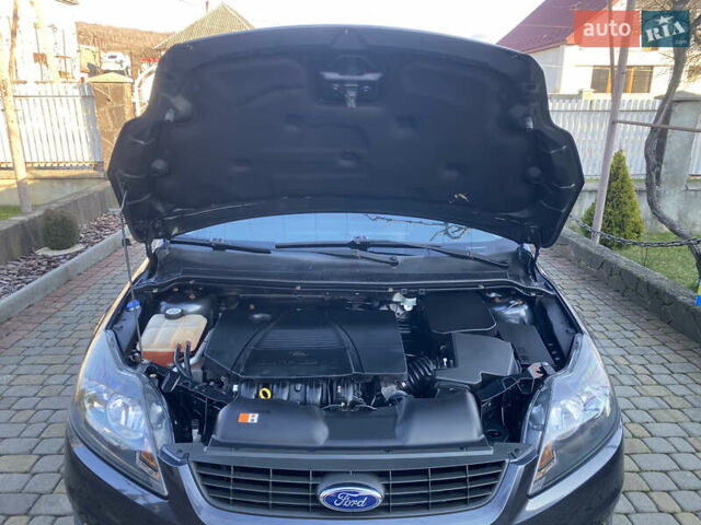 Серый Форд Фокус, объемом двигателя 1.8 л и пробегом 287 тыс. км за 5200 $, фото 31 на Automoto.ua