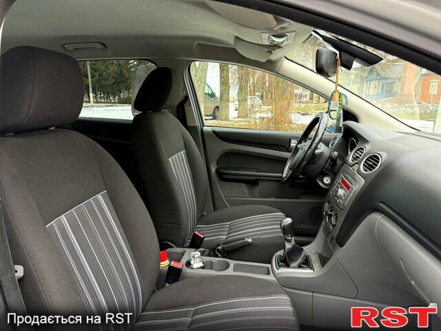 Серый Форд Фокус, объемом двигателя 1.6 л и пробегом 179 тыс. км за 5800 $, фото 8 на Automoto.ua