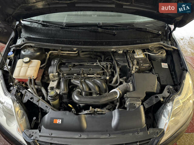 Серый Форд Фокус, объемом двигателя 1.6 л и пробегом 175 тыс. км за 4750 $, фото 20 на Automoto.ua