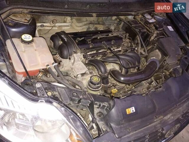 Серый Форд Фокус, объемом двигателя 1.6 л и пробегом 174 тыс. км за 4900 $, фото 12 на Automoto.ua